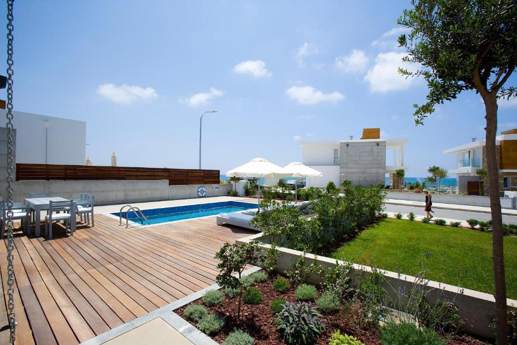 Paradise Cove Luxurious Beach Villas Paphos Habitación foto